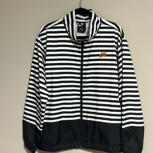 Nike Woman Nylon sport jacket Navy and white stripe. Size 1X new w/o tags.